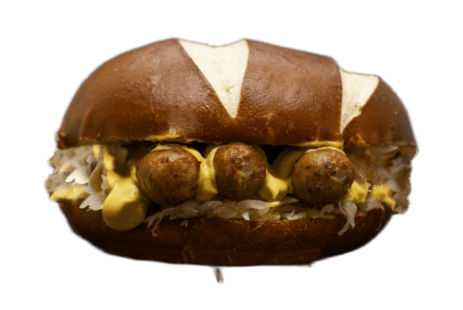 Drei Nürnberger Rostbratwürstl im Laugenbrötchen mit Senf und Sauerkraut im Imbiss Curry am Schloss Dresden